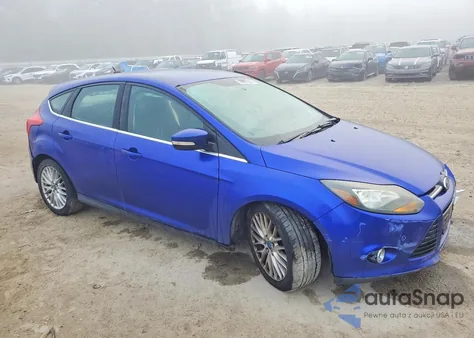 2014 Ford Focus Titanium z USA, uszkodzony, nr VIN 1FADP3N20EL231890